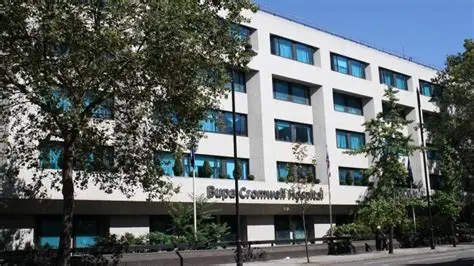 Modern private hospital building in the UK with clear signage