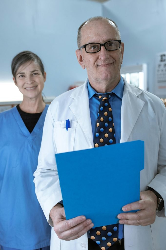 Doctor and patient in private hospital consultation room