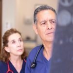 nhs waiting times doctors looking at image