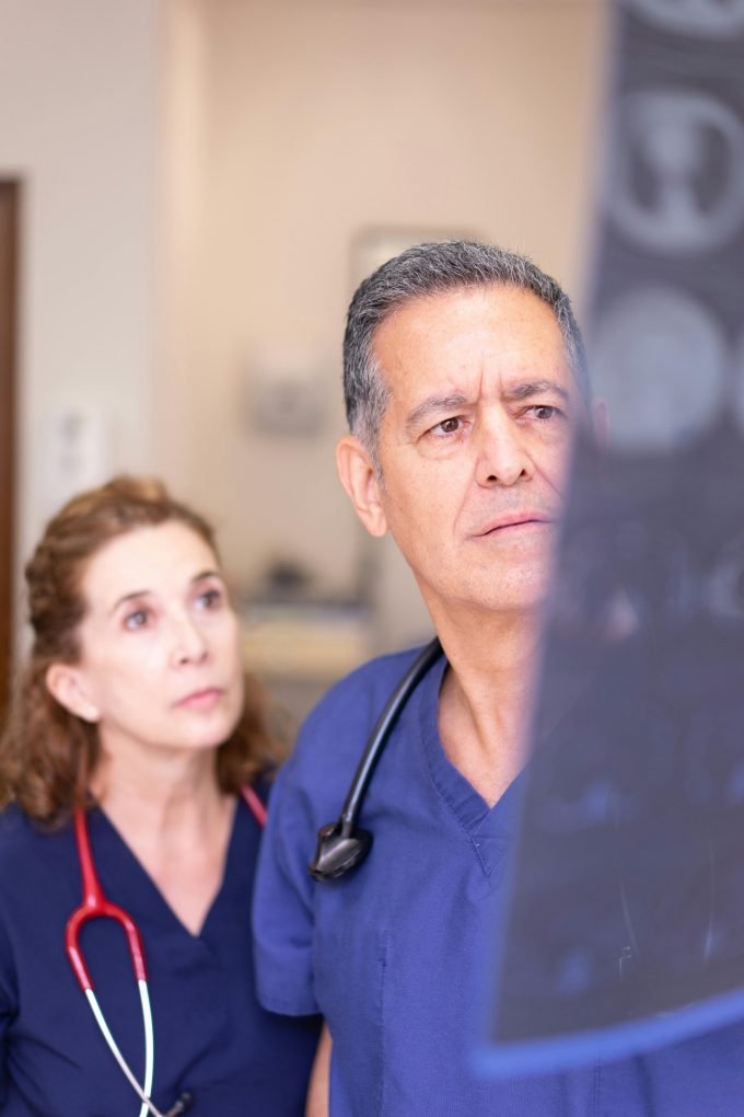 nhs waiting times doctors looking at image
