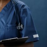 Patient having blood drawn in private UK clinic for liver function testing